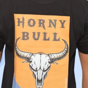 A blazing bull skull with massive horns set against a bold yellow backdrop, stamped with the fierce words “HORNY BULL.” A savage symbol of raw power, primal rage, and untamed attitude.