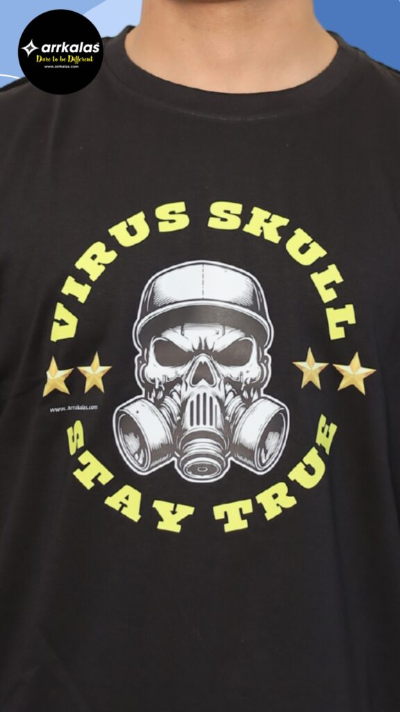 A bold graphic T-shirt design featuring a fierce skull in a gas mask and cap, framed by yellow text reading “VIRUS SKULL STAY TRUE” and flanked by three stars on each side. The edgy design from Arrkalas evokes rebellion, survival, and street power with a post-apocalyptic attitude