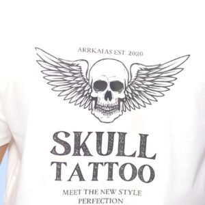 A bold skull with detailed wings, symbolizing freedom and rebellion, featured in a tattoo design style. Text reads "SKULL TATTOO – Meet the new style perfection" with branding for Arrkalas EST. 2020.