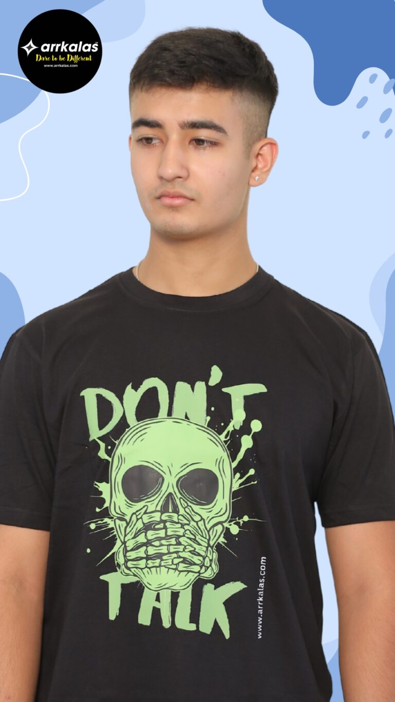 ARRKALAS graphic featuring a neon green skull with skeletal hands silencing it, set against bold splatter art and the phrase “DON’T TALK” — a bold statement of rebellion and restraint