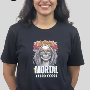 Black Arrkalas women’s T-shirt featuring a striking ‘MORTAL’ design with a vibrant skull-faced woman adorned with a colorful flower crown and flowing white hair — symbolizing beauty, life, and impermanence in bold artistic style.