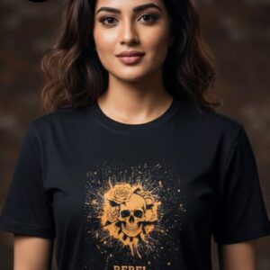 A confident woman stands against a blurred, artistic backdrop wearing a striking black T-shirt. The shirt features an eye-catching orange graphic with detailed roses and a skull at its heart, enveloped in a radiant splatter design. Beneath this powerful imagery, the words “REBEL HARMONY” are boldly printed, symbolizing both strength and grace