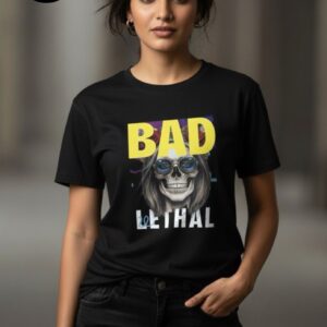A stylish woman wearing a striking black T-shirt with bold yellow lettering that says “BAD” above a unique graphic and the word “LETHAL” in crisp white, embodying fierce confidence, modern attitude, and standout street fashion